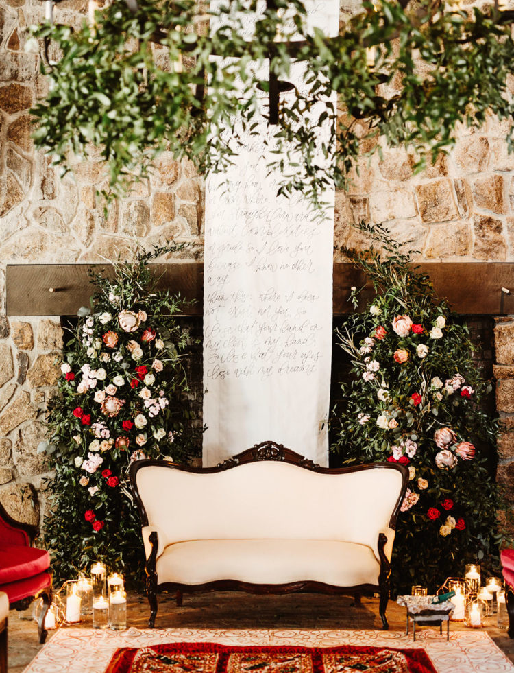 The ceremony space was beautifully decorated with lush blooms, calligraphy and candles