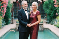 07 The groom’s parents look really glam and chic – look at that red sequin dress