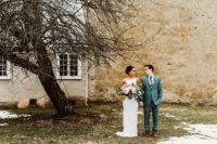 09 After that the couple dressed up into more European clothes – the groom was wearign a seafoam green suit and the bride was wearing a modern wedding gown