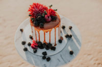 09 The wedding cake was created for the shoot, it was dripping in a caramel sauce and topped with florals and blackberries