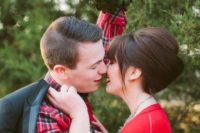 09 the groom wearing a red plaid shirt and the bride in a matching red cardigan