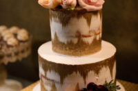 10 The wedding cake was ikat, with gold and white touches and fresh blooms