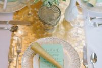 10 a gold sequin table runner for a mint and gold New Year’s Ever table setting