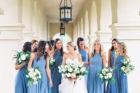 13 beautiful robin’s egg blue bridesmaids’ dresses with a halter neckline and a maxi skirt