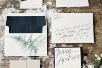 13 neutral and black winter wedding invitation set with pressed lining and evergreen prints
