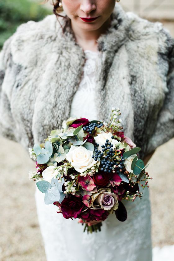 white and lavender roses, privet berries, fuchsia blooms, pale greenery for a cool winter look