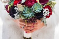 17 a bold bouquet with privet berries, red and burgundy roses, succulents and pale millet