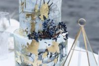 17 a crazy marbeleized and watercolro splash wedding cake with gold leaf and berries