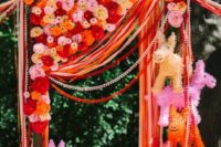 17 a super fun piñata, streamer and paper flower wedding canopy for a Mexico-inspired wedding