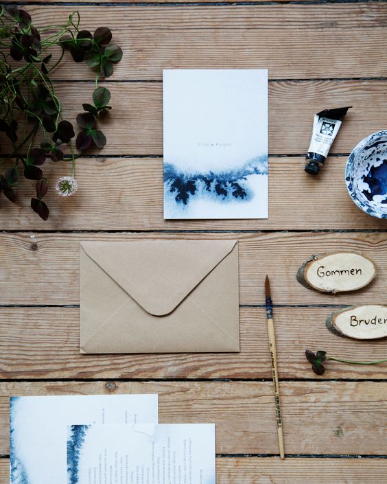 watercolor navy blue wedding invites and craft paper envelopes will fit many different wedding themes