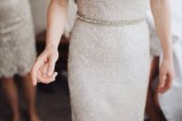 18 all sparkling winter wedding dress with short sleeves and an embellished belt – you don’t need more to stand out