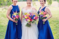 18 mismatched royal blue high low bridesmaids’ dresses