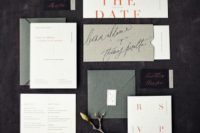 19 a modern wedding invitation set done in neutrals, greens and with red letters for a modern moody wedding
