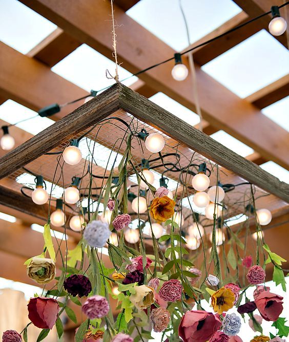 a paper flower chandelier willl be a great decoration for the wedding reception