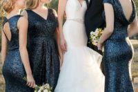26 mismatching navy sequin bridesmaids’ dresses