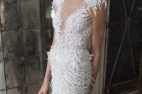27 an illusion neckline wedding dress with fringe looks very playful and remind of snow flakes