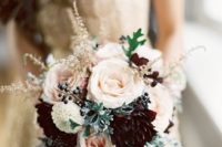 27 blush wedding bouquet with burgundy blooms, pale millet and privet berries for a romantic look with a moody touch