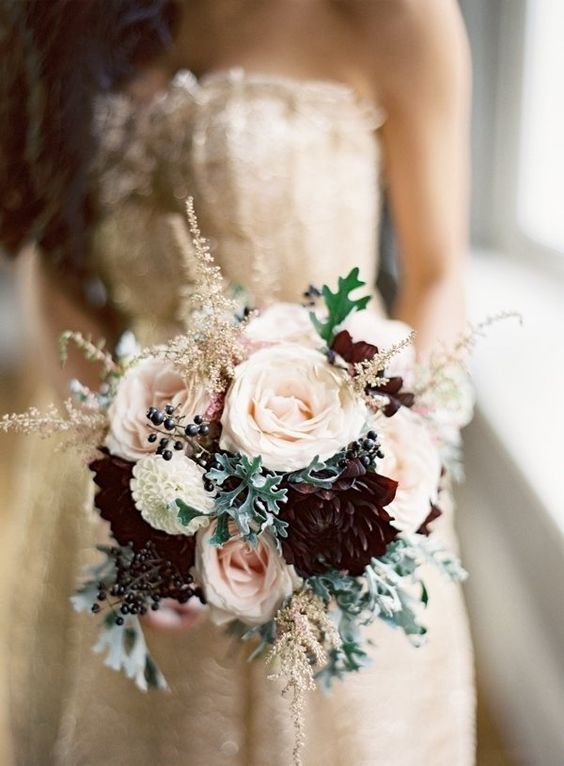 blush wedding bouquet with burgundy blooms, pale millet and privet berries for a romantic look with a moody touch