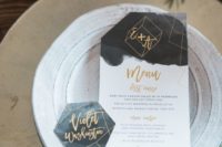 29 a modern menu and place cards done with dark watercolor and gold touches for a chic modern wedding