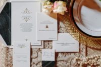 29 glam black and white New Year wedding invitations with an agate slice print and gold letters