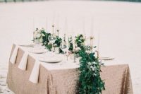 32 fresh greenery and white blooms table runner looks super bold on a copper tablecloth