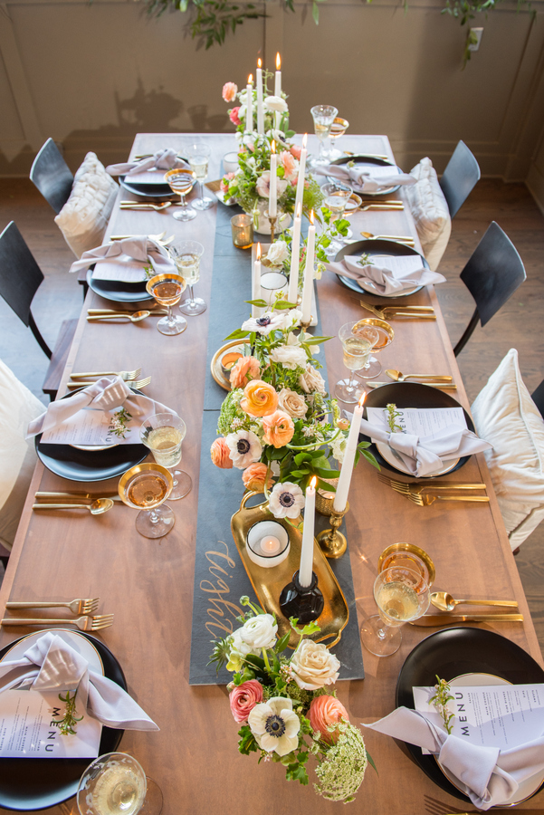 Gold cutlery, gold rimmed glasses, gold candle holders and bowls added glam to the tablescape