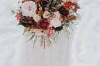 02 a bold fall wedding bouquet with red, burgundy, orange, pink and pastel blooms and antlers