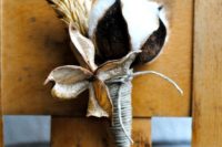 02 a gorgeous cotton and wheat boutonniere for a groom’s look to add coziness