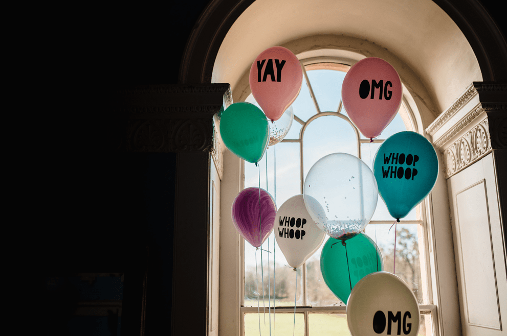 The couple chose to have colorful and printed balloons instead of flowers that can cost a lot