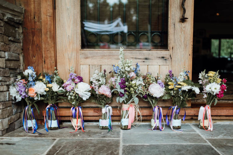The wedding bouquets were also with coral, pink and blue blooms