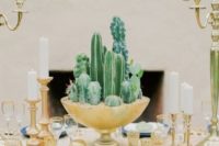 03 a tall gilded bowl with cacti is a chic idea for a desert-inspired wedding