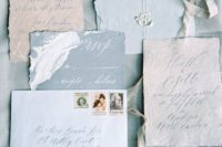 03 pastel blue wedding stationery suite with a raw edge, calligraphy and seals