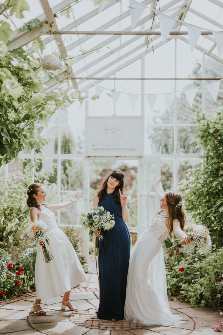 The bridesmaid was wearing a sleeveless navy maxi gown