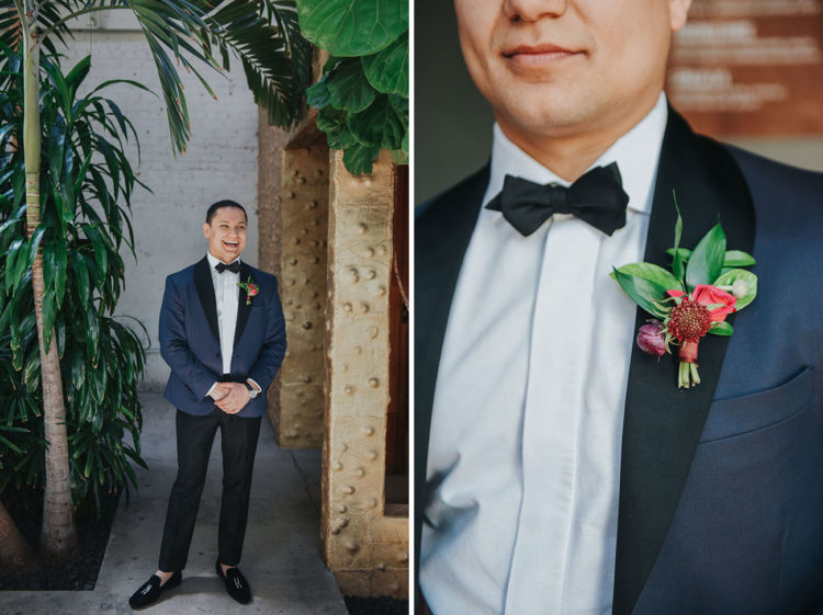 The groom was wearing a tuxedo with a navy jacket and black pants and moccasins
