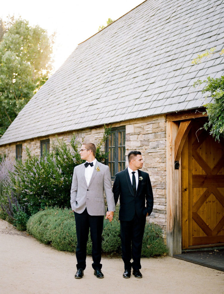 The second groom was wearing a classic black tux with a tie
