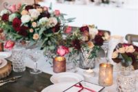 05 a chic winter tablescape with wood slices as chargers and candle holders
