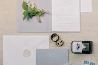 05 a modern pastel blue invitation set with seals, blue ribbons and pale calligraphy