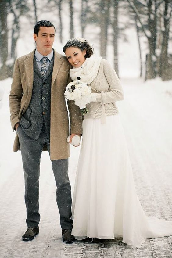 a neutral sweater and a white cable knit scarf for an elegant bridal look