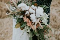 05 a unique wedding bouquet with greenery, cotton, foliage and antlers for a woodland or boho bride