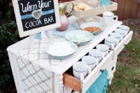 07 a hot cocoa bar is another great idea, make it using a vintage sideboard you have at hand and a cute chalkboard sign