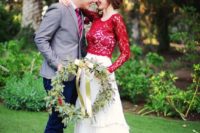 07 a red lace top with long sleeves over a white wedding dress, a green wreath