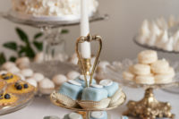 08 These are Cinderella blue petit fours with a fondant wax seal