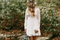 08 a boho lace wedding dress with long sleeves and a modest neckline, the length is over the knee