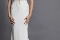 08 a stunning cap sleeve plunging neckline wedding dress with a textural bodice and sleek sheath skirt