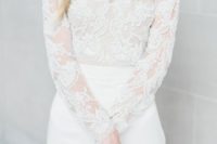08 an ethereal wedding dress with a lace bodice with long sleeves, a high neckline and a sleek skirt