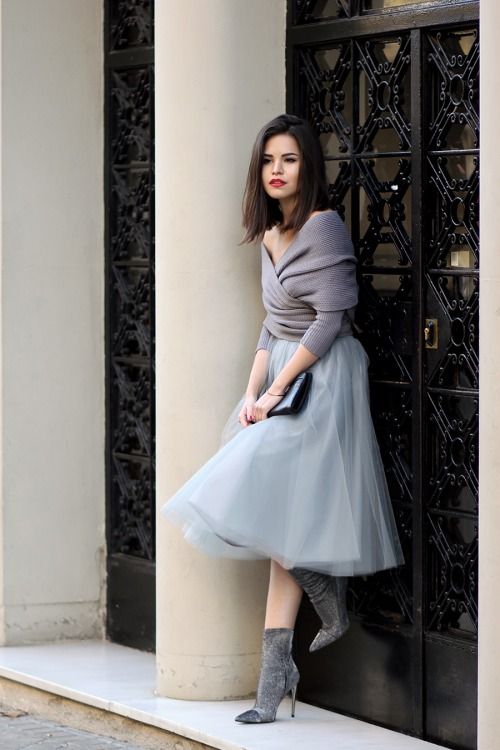 a grey tulle midi skirt, a grey off the shoulder sweater with half sleeves and grey suede booties look very feminine