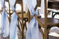 09 wooden chairs covered with ombre blue airy fabric to make them look airy and breezy