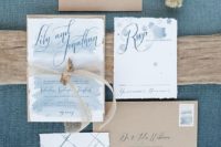10 pastel blue watercolor wedding invitations and kraft paper envelopes for a beach wedding