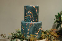 11 The gorgeous wedding cake done in teal and with a marble pattern, decorated with gold leaf