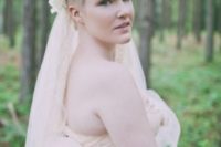 11 a pixie haircut with a fresh floral crown in beautiful pastel shades and a veil added